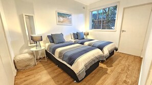 Second bedroom can be made as two singles or one king bed (not both)