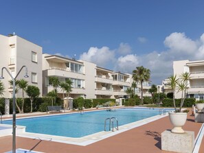 Sky, Cloud, Water, Building, Plant, Azure, Tree, Swimming Pool, Condominium, Shade