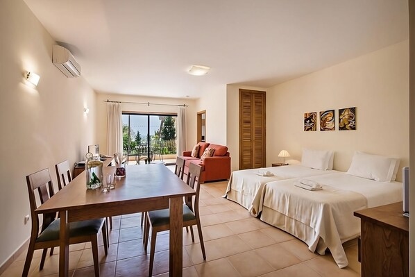 Comfortable Unit with Twin bed and dining table