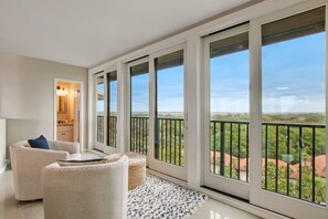 Additional Living Area Seating with a Gorgeous View of Tree Canopy and the Intracoastal Waterway