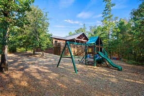Enjoy the spacious outdoor area with plenty of seating and a fun playground for the kids.