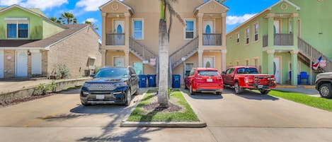 Tandem parking for 2 cars per unit (4) total