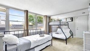 Our bedroom is designed to accommodate everyone comfortably with a double-size bed and a bunk bed.