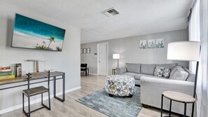 Our inviting living room, where comfort and style seamlessly blend. 