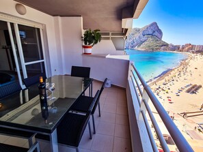 Covered terrace with side sea and Peñón de Ifach views