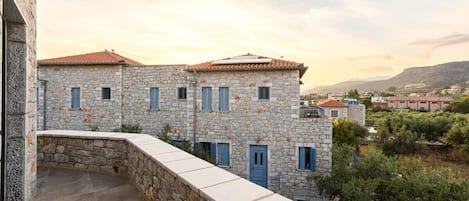 Nestled in nature's embrace, our stone-built home offers rustic charm and tranquility in Stoupa.