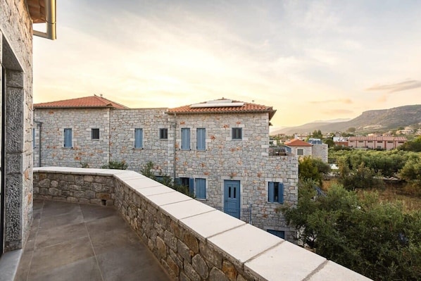 Nestled in nature's embrace, our stone-built home offers rustic charm and tranquility in Stoupa.