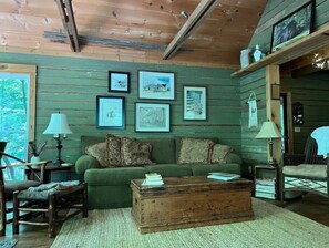 Wall of local art adorns the walls of this spectacular cabin.