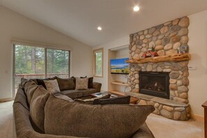 A large fireplace in the Living room creates the perfect backdrop to your Tahoe getaway
