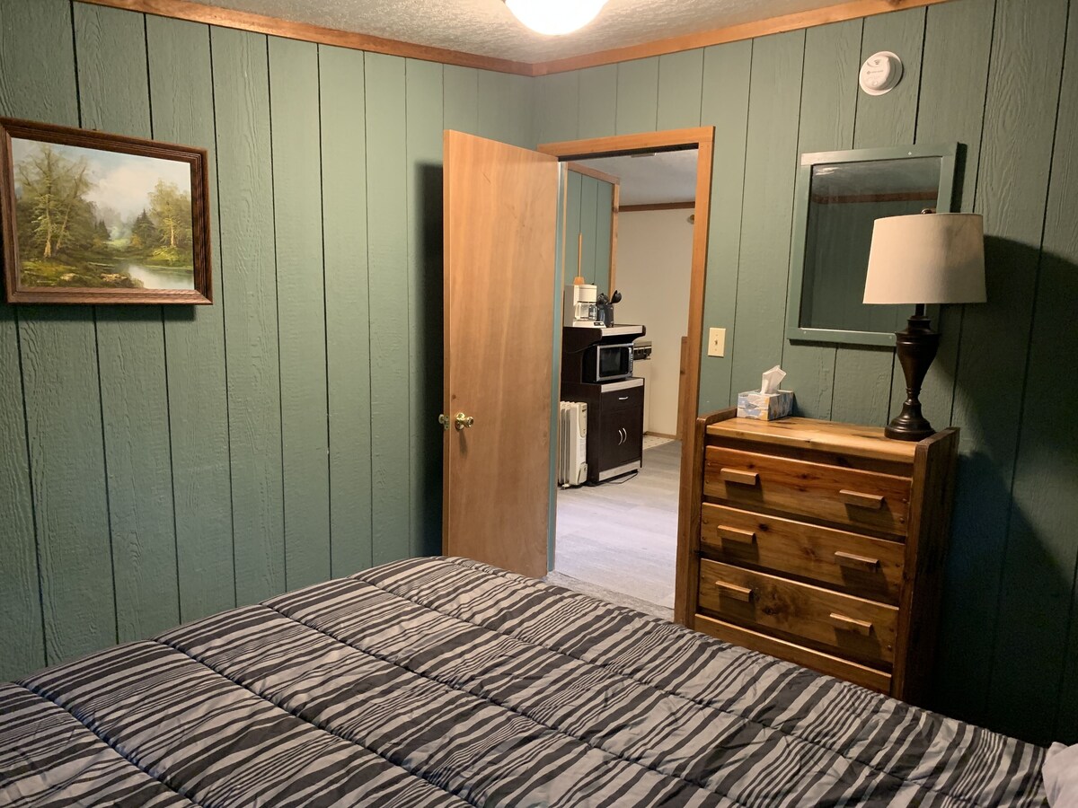Rustic cabins in secluded campground with lake access and woods to wander in.