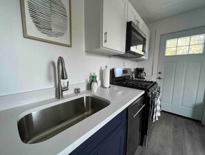 There is a small walk-out balcony located just off the kitchen. 