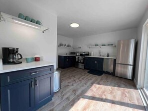 Newly renovated full kitchen with coffee and tea station