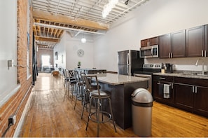Extremely spacious and Impressionable kitchen w/breakfast station, island & pallet cameo bar for extra guests & spirits, brand new stainless steel appliances, microwave, 35' TV and plenty kitchen gadgets