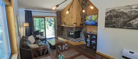 Main living area with forest views.