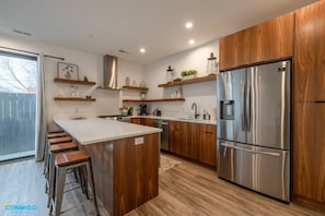 Embrace your culinary creativity in our fully equipped kitchen. From modern appliances to ample counter space, this kitchen is a haven for food enthusiasts. Prepare delicious meals and gather with loved ones in this functional and stylish space.