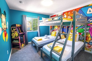 Exciting Mario themed room with triple bunk bed, arcade, and Mickey Mouse mural