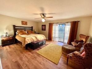 Primary Suite with sitting area, walk in closet and Large Balcony Views