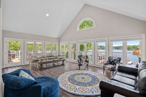 Sunroom with dining table seating for 8.