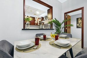 Dining Area: Enjoy delightful meals in a stylish space with vibrant decor and a warm ambiance!