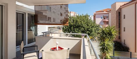 Roofed terrace with sitting area