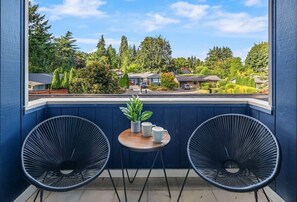 Have a cup of coffee in this cozy 2nd floor balcony.