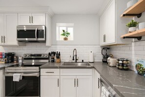 High end finish kitchen with stainless steel appliance.