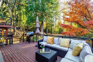 Chill in our cozy L sofa in the private backyard