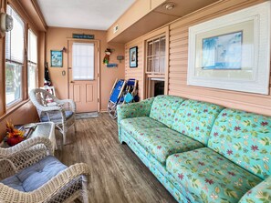 Plenty of room for all guests on this eclectic sunporch Plenty of room for all guests on this eclectic sunporch 