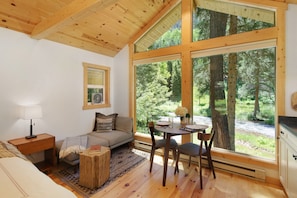 Cozy up next to the river on your ottoman