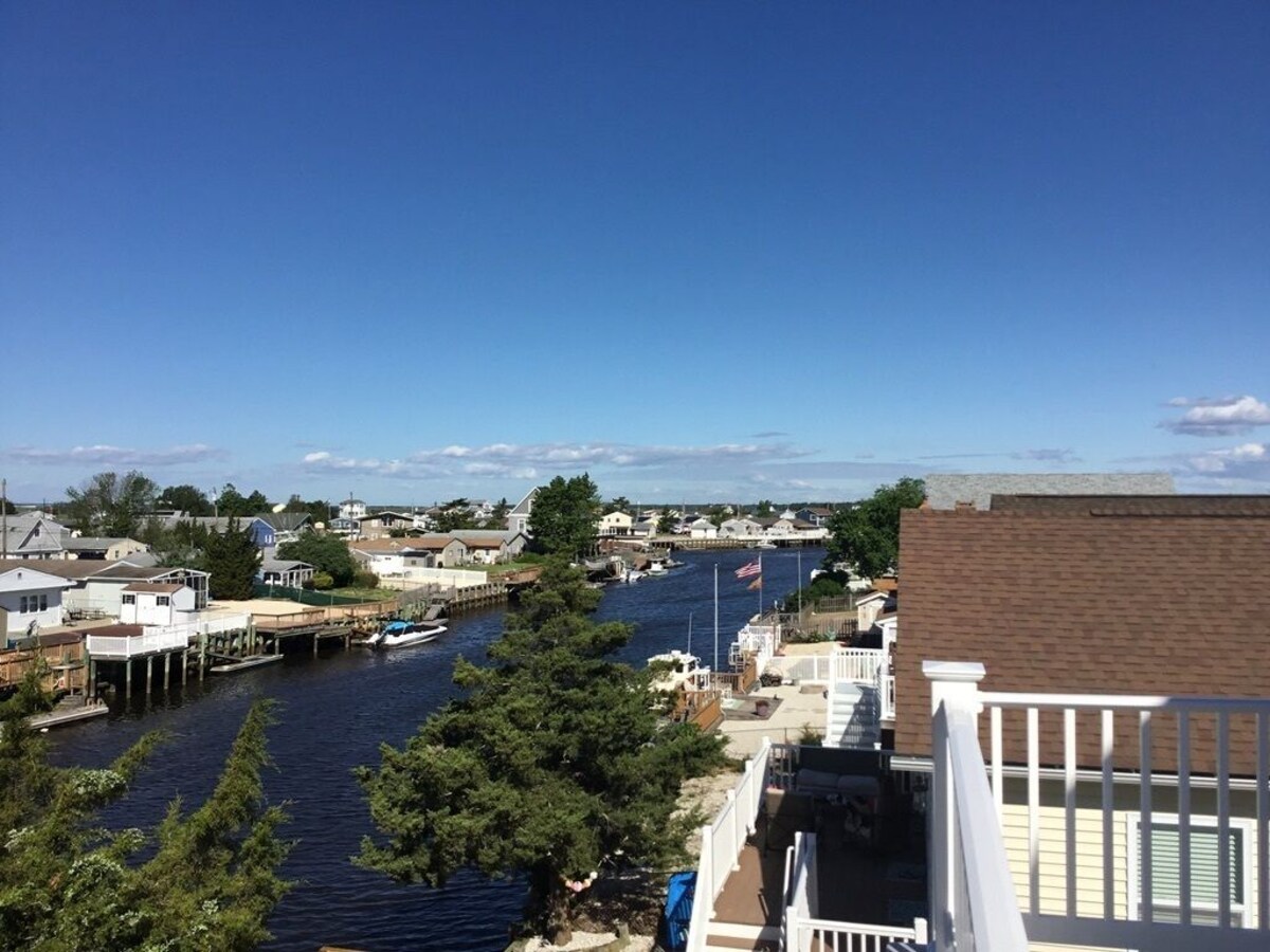 Enchanting Mystic Island Beach Home on picturesque lagoon near Jersey Shore.