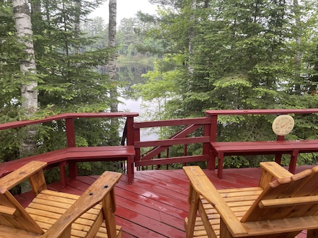 Relax on the deck overlooking the lake.