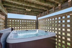 Private outdoor hot tub with room for up to 7 adults