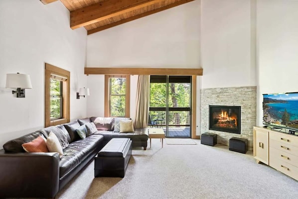 Relax and recharge in this bright & open mountain retreat while you cozy up by the fire or enjoy the views from the private balcony.