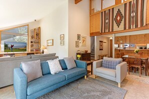 Living and Family Rooms features vaulted ceilings.