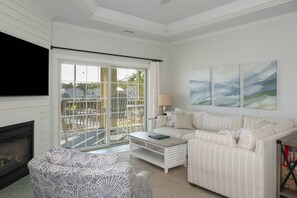 Plenty of Comfortable Seating in the Living Area to Enjoy the View & Watch your Favorite Shows.