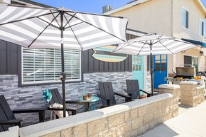 Lower patio with comfortable seating.