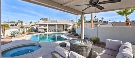 Back Patio Pool Area with Game Storage center and patio funiture