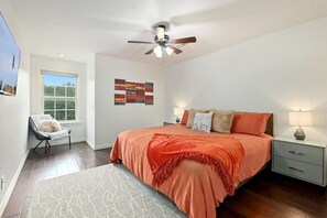 Our second bedroom has a King-size bed, closet, 43-inch Insignia Smart TV and nearby bathroom.