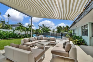 Outdoor shaded lounge and dining area