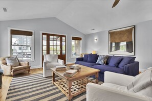 Relaxing in "beachy" style is easy in this beautiful living  room