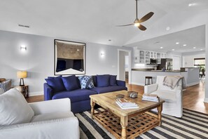 Relaxing in "beachy" style is easy in this beautiful living  room