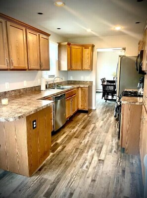 Kitchen looking onto dining room