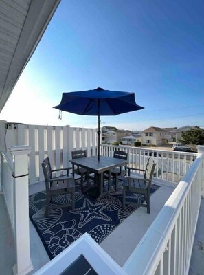 Enjoy the private deck overlooking the built in pool after a day at the beach!