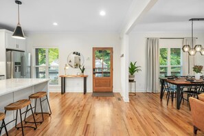 Open concept kitchen, living room, and dining area. Perfect for enjoying time with friends and family.