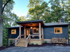 Large driveway that can hold 6 vehicles, including your EV vehicles.  We have a 220V plug, so bring your own plug and stay charged during your getaway!