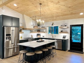 Enter the home to our fully equipped kitchen with eat in bar and high end appliances!  Bar seats 6 for a nice casual dining experience.  