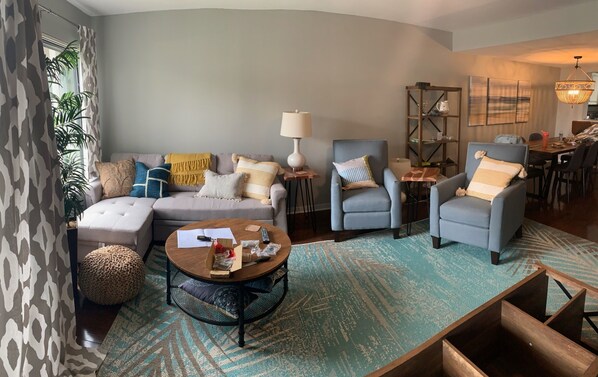 Cozy, comfortable and modern living room with chaise and recliners