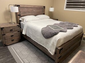 Main bedroom with handcrafted, hardwood (maple) furniture.