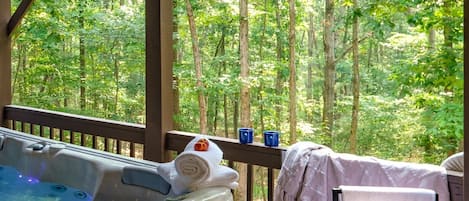 Acres of woods to view from private rejuvenating seven person hot tub