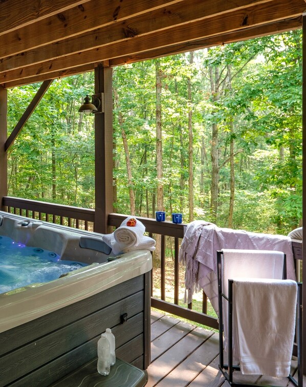 Acres of woods to view from private rejuvenating seven person hot tub